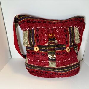 Red and black boho shoulder bag with zipper closure